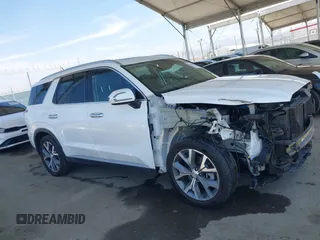 2020 Hyundai Palisade SEL z VIN KM8R44HEXLU128533, wystawiony jako IAAI lot #42094411 z przebiegiem 61 366 mil mil oraz . Historia ofert i sprzedaży dostępna na DreamBid. Obrazek 14.