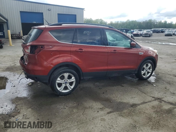 2015 Ford Escape SE with VIN 1FMCU9GX2FUB47068, listed as a Copart auction lot 54772975 with 97,348 mi miles and Salvage Title. Bid and sale history available at DreamBid. Image 3.