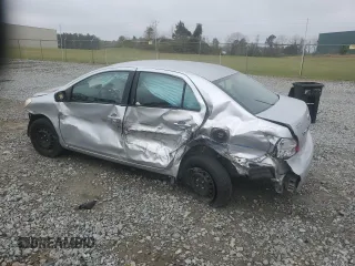 2012 Toyota Yaris with VIN JTDBT4K33CL010538, listed as a Copart auction lot 49124505 with 166,737 mi miles and Salvage Title. Bid and sale history available at DreamBid. Image 2.