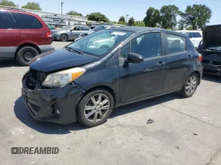 2012 Toyota Yaris L with VIN JTDKTUD30CD507828, listed as a Copart auction lot 62135795 with 152,320 mi miles and Salvage title. Bid and sale history available at DreamBid. Image 1.