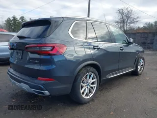 2022 BMW X5 xDrive45e with VIN 5UXTA6C05N9K75681, listed as a IAAI auction lot 40954930 with 13,463 mi miles. Bid and sale history available at carsss.com. Image 4.