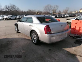 2007 Chrysler 300 Touring with VIN 2C3LA53G57H785979, listed as a IAAI auction lot 36241614 with 220,841 mi miles. Bid and sale history available at carsss.com. Image 3.