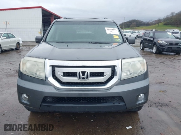 2011 Honda Pilot EX-L with VIN 5FNYF4H67BB001622, listed as a IAAI auction lot 41954379 with 157,910 mi miles and . Bid and sale history available at carsss.com. Image 12.