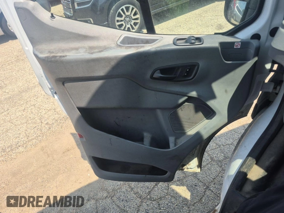2019 Ford Transit with VIN 1FTYR1CM6KKA85012, listed as a IAAI auction lot 42898811 with 246,228 mi miles and . Bid and sale history available at DreamBid. Image 30.