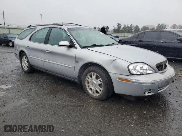 2004 Mercury Sable LS Premium with VIN 1MEHM59S54A605655, listed as a Copart auction lot 82005284 with 101,723 mi miles and Salvage Title. Bid and sale history available at DreamBid. Image 4.