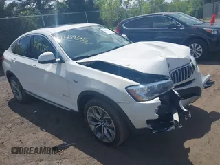 2015 BMW X4 xDrive35i z VIN 5UXXW5C54F0E88882, wystawiony jako IAAI lot #42159385 z przebiegiem 110 000 mil mil oraz . Historia ofert i sprzedaży dostępna na DreamBid. Obrazek 1.