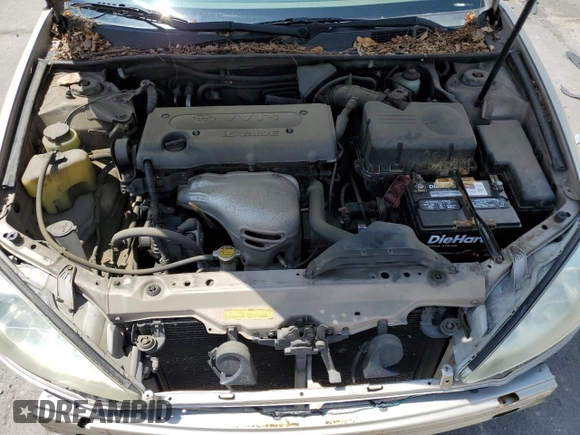 2002 Toyota Camry LE z VIN JTDBE32K620035753, wystawiony jako Copart lot #60176235 z przebiegiem 258 793 mil mil oraz Czysty tytuł • Clean title. Historia ofert i sprzedaży dostępna na DreamBid. Obrazek 11.