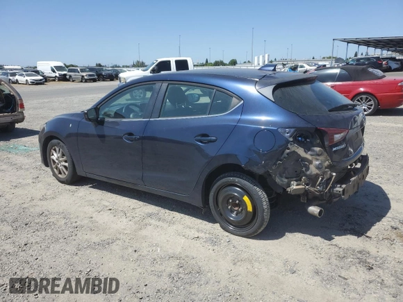 2015 Mazda 3 i Grand Touring z VIN 3MZBM1M72FM145070, wystawiony jako Copart lot #58419525 z przebiegiem 61 255 mil mil oraz Szkoda całkowita • Salvage title. Historia ofert i sprzedaży dostępna na DreamBid. Obrazek 2.
