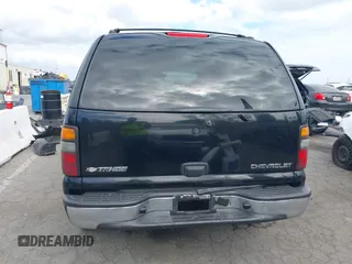 2005 Chevrolet Tahoe Z71 with VIN 1GNEC13TX5R145310, listed as a IAAI auction lot 42056793 with 159,002 mi miles and . Bid and sale history available at DreamBid. Image 15.
