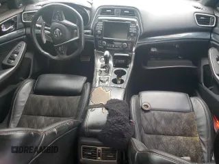 2019 Nissan Maxima Platinum z VIN 1N4AA6AV5KC373153, wystawiony jako Copart lot #43813565 z przebiegiem 106 698 mil mil oraz Szkody całkowita. Historia ofert i sprzedaży dostępna na DreamBid. Obrazek 8.