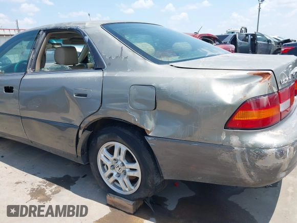 1997 Lexus ES 300 z VIN JT8BF22G8V5004366, wystawiony jako IAAI lot #42298289 z przebiegiem 376 934 mil mil oraz . Historia ofert i sprzedaży dostępna na DreamBid. Obrazek 18.