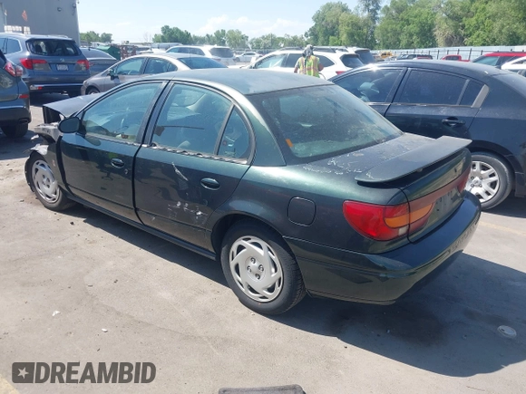 2001 Saturn SL with VIN 1G8ZK527X1Z238857, listed as a IAAI auction lot 42460370 with 76,231 mi miles and . Bid and sale history available at DreamBid. Image 3.