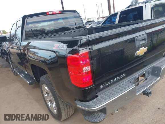 2014 Chevrolet Silverado 1500 LT with VIN 1GCVKREC5EZ325771, listed as a IAAI auction lot 41691858 with 123,475 mi miles and . Bid and sale history available at DreamBid. Image 3.