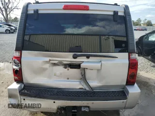 2006 Jeep Commander with VIN 1J8HH48K96C289162, listed as a Copart auction lot 80979074 with 170,581 mi miles and Salvage title. Bid and sale history available at DreamBid. Image 6.