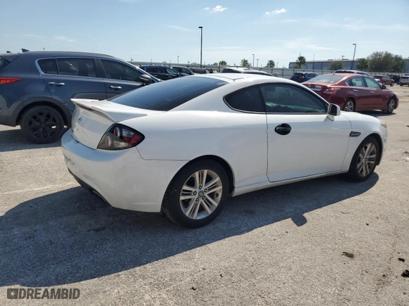 2007 Hyundai Tiburon GS with VIN KMHHM66D67U248918, listed as a Copart auction lot 77618184 with 145,703 mi miles and Salvage Title. Bid and sale history available at carsss.com. Image 3.
