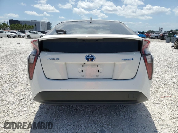 2016 Toyota Prius Two z VIN JTDKBRFU4G3004742, wystawiony jako Copart lot #57834035 z przebiegiem 71 767 mil mil oraz Szkoda całkowita • Salvage title. Historia ofert i sprzedaży dostępna na DreamBid. Obrazek 6.