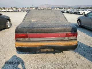 1992 Nissan Maxima z VIN JN1HJ01F1NT007180, wystawiony jako Copart lot #71271334 z przebiegiem 252 299 mil mil oraz Tytuł czysty. Historia ofert i sprzedaży dostępna na DreamBid. Obrazek 6.
