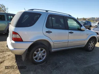 2000 Mercedes-Benz M-Class with VIN 4JGAB72E5YA173269, listed as a Copart auction lot 71520714 with 239,248 mi miles and Clean Title. Bid and sale history available at carsss.com. Image 3.
