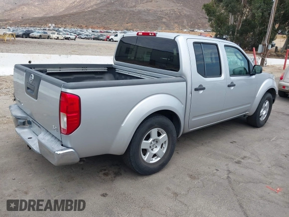 2006 Nissan Frontier SE with VIN 1N6AD07U56C459398, listed as a IAAI auction lot 42756580 with 145,988 mi miles and . Bid and sale history available at DreamBid. Image 4.