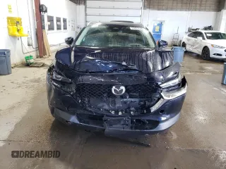 2024 Mazda CX-30 S Premium with VIN 3MVDMBDM7RM697044, listed as a Copart auction lot 55895525 with 17,145 mi miles and Salvage title. Bid and sale history available at DreamBid. Image 5.