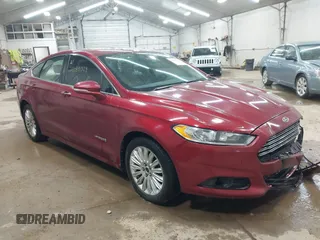 2013 Ford Fusion SE Hybrid with VIN 3FA6P0LU9DR150396, listed as a IAAI auction lot 42080329 with 195,665 mi miles. Bid and sale history available at carsss.com. Image 1.