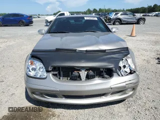 2003 Mercedes-Benz SLK 320 with VIN WDBKK65F03F286130, listed as a Copart auction lot 61544385 with 98,899 mi miles and Salvage title. Bid and sale history available at DreamBid. Image 5.