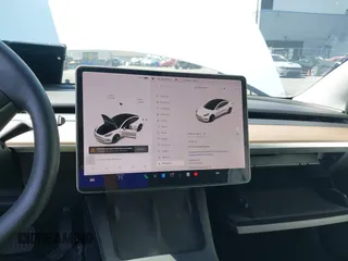 2021 Tesla Model 3 Standard Range Plus z VIN 5YJ3E1EA8MF100456, wystawiony jako IAAI lot #42100840 z przebiegiem 64 389 mil mil oraz . Historia ofert i sprzedaży dostępna na DreamBid. Obrazek 17.