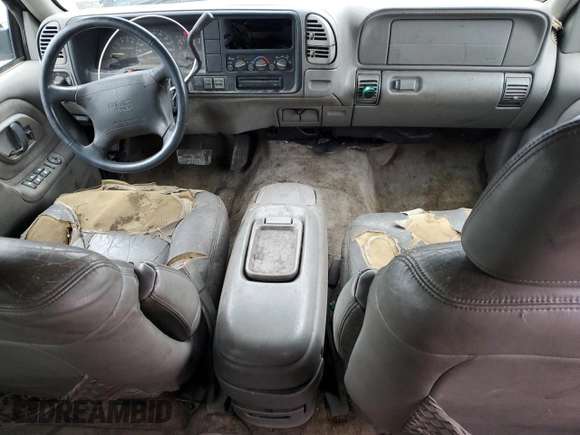 1997 GMC Suburban z VIN 1GKFK16R3VJ761305, wystawiony jako Copart lot #85785574 z przebiegiem 269 721 mil mil oraz Szkoda całkowita • Salvage title. Historia ofert i sprzedaży dostępna na DreamBid. Obrazek 8.