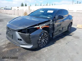 2023 Lexus RZ with VIN JTJAAAAB5PA011228, listed as a IAAI auction lot 41550311 with 6984 miles. Bid and sale history available at carsss.com. Image 24.