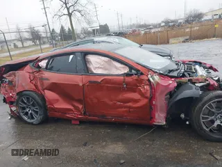 2021 Tesla Model S Plaid z VIN 5YJSA1E64MF441923, wystawiony jako IAAI lot #41465456 z przebiegiem Nie podano mil oraz . Historia ofert i sprzedaży dostępna na DreamBid. Obrazek 13.