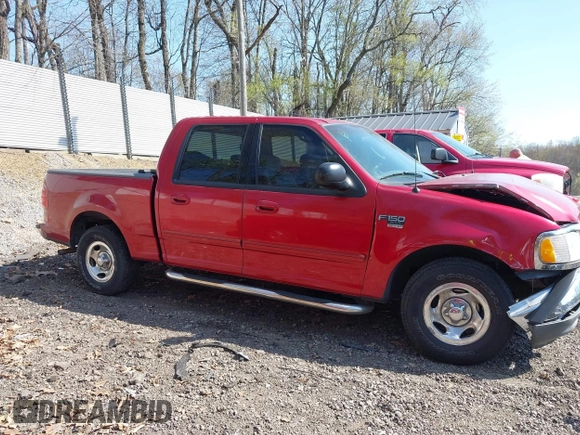 2003 Ford F-150 XLT with VIN 1FTRW07L13KD81923, listed as a IAAI auction lot 42112168 with 147,039 mi miles. Bid and sale history available at carsss.com. Image 14.