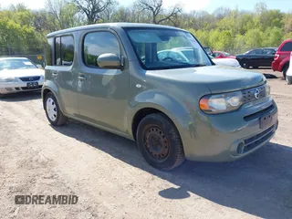 2010 Nissan Cube S z VIN JN8AZ2KR6AT150832, wystawiony jako IAAI lot #42206804 z przebiegiem 198 474 mil mil oraz . Historia ofert i sprzedaży dostępna na DreamBid. Obrazek 1.
