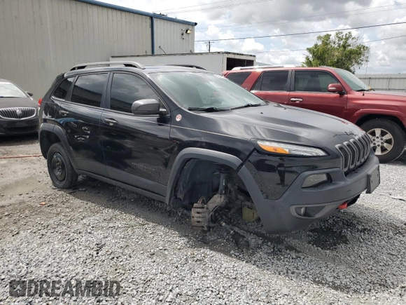 2018 Jeep Cherokee Trailhawk with VIN 1C4PJMBB0JD500672, listed as a Copart auction lot 63207915 with 72,954 mi miles and Salvage title. Bid and sale history available at DreamBid. Image 4.