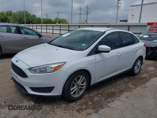 2018 Ford Focus SE z VIN 1FADP3F22JL292697, wystawiony jako IAAI lot #42094271 z przebiegiem 43 614 mil mil oraz . Historia ofert i sprzedaży dostępna na DreamBid. Obrazek 17.