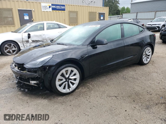 2022 Tesla Model 3 with VIN 5YJ3E1EA0NF372095, listed as a Copart auction lot 54958215 with 148,441 mi miles and Clean Title. Bid and sale history available at DreamBid. Image 1.