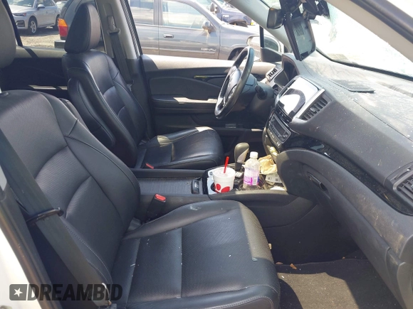2019 Honda Ridgeline RTL-E with VIN 5FPYK3F71KB017906, listed as a IAAI auction lot 42670476 with 58,288 mi miles and . Bid and sale history available at DreamBid. Image 5.