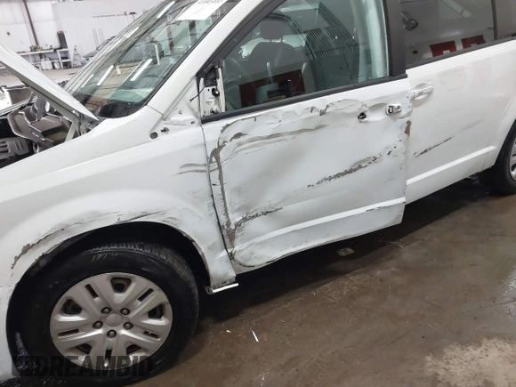 2018 Dodge Grand Caravan SE with VIN 2C4RDGBG5JR190786, listed as a IAAI auction lot 41603163 with 102,351 mi miles and . Bid and sale history available at DreamBid. Image 6.