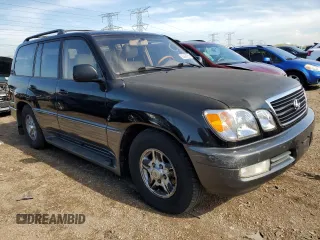 2002 Lexus LX 470 z VIN JTJHT00W923521442, wystawiony jako Copart lot #55936255 z przebiegiem 184 103 mil mil oraz Tytuł czysty. Historia ofert i sprzedaży dostępna na DreamBid. Obrazek 4.