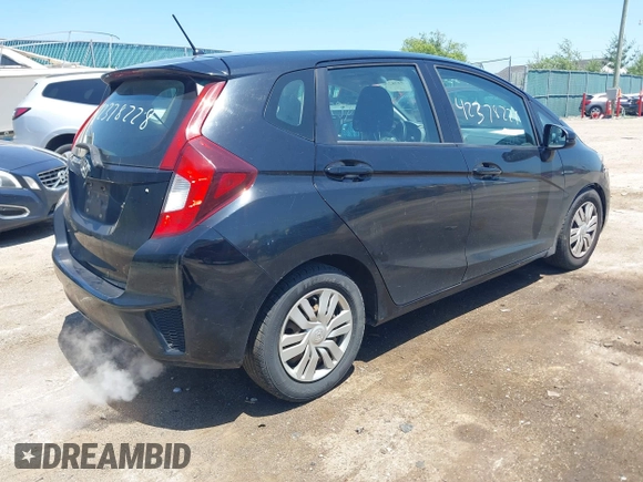 2015 Honda Fit LX z VIN 3HGGK5H56FM712266, wystawiony jako IAAI lot #42378228 z przebiegiem 140 423 mil mil oraz . Historia ofert i sprzedaży dostępna na DreamBid. Obrazek 4.
