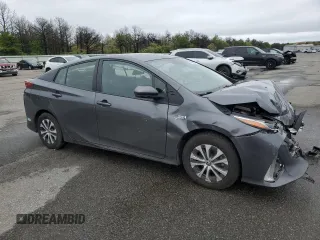 2021 Toyota Prius LE z VIN JTDKAMFP1M3172737, wystawiony jako Copart lot #57056205 z przebiegiem Nie podano mil oraz Szkoda całkowita • Salvage title. Historia ofert i sprzedaży dostępna na DreamBid. Obrazek 4.