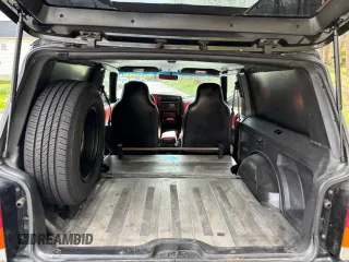 1997 Jeep Cherokee with VIN 1J4FT67S6VL571732, listed as a Copart auction lot 56349005 with 153,146 mi miles and Clean title. Bid and sale history available at DreamBid. Image 6.