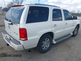 2005 Cadillac Escalade z VIN 1GYEC63T55R115387, wystawiony jako IAAI lot #41791855 z przebiegiem 165 246 mil mil oraz . Historia ofert i sprzedaży dostępna na DreamBid. Obrazek 4.