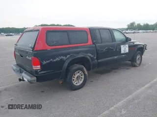 2001 Dodge Dakota Sport with VIN 1B7HG2AN31S225393, listed as a IAAI auction lot 42183298 with 244,961 mi miles and . Bid and sale history available at carsss.com. Image 4.