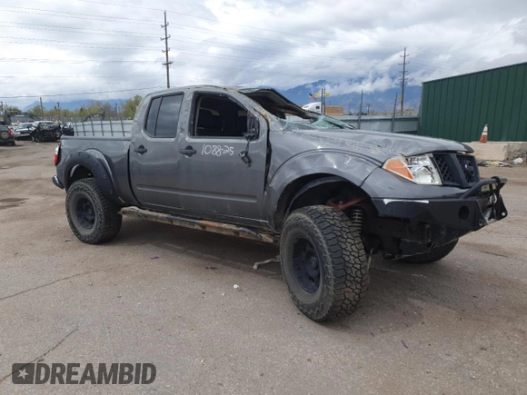 2008 Nissan Frontier LE with VIN 1N6AD09W58C437225, listed as a Copart auction lot 52687295 with 247,258 mi miles and Salvage title. Bid and sale history available at DreamBid. Image 4.
