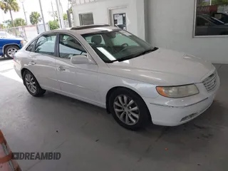 2007 Hyundai Azera SE with VIN KMHFC46F77A207828, listed as a IAAI auction lot 42813405 with 119,746 mi miles and . Bid and sale history available at DreamBid. Image 1.