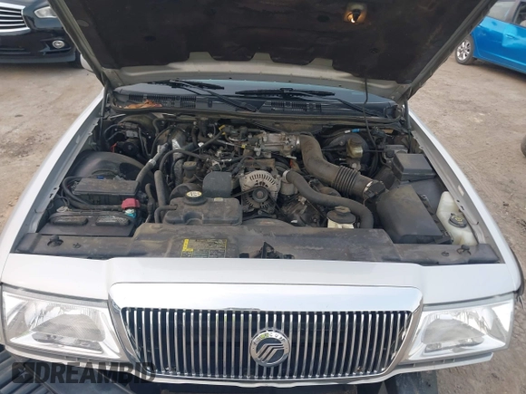 2003 Mercury Grand Marquis LS Premium z VIN 2MEFM75W03X658118, wystawiony jako IAAI lot #42435812 z przebiegiem 174 893 mil mil oraz . Historia ofert i sprzedaży dostępna na DreamBid. Obrazek 10.