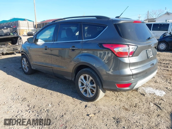 2018 Ford Escape SE with VIN 1FMCU0GD0JUA87303, listed as a IAAI auction lot 41612502 with 70,233 mi miles. Bid and sale history available at carsss.com. Image 3.