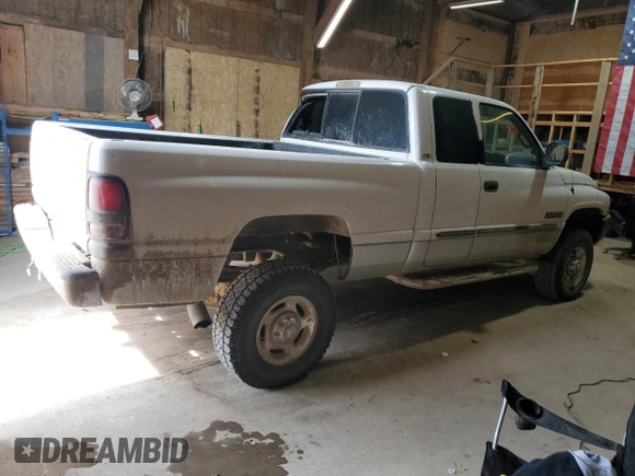 2002 Dodge 2500 z VIN 3B7KF236X2M256911, wystawiony jako Copart lot #51001775 z przebiegiem 208 199 mil mil oraz Tytuł czysty. Historia ofert i sprzedaży dostępna na DreamBid. Obrazek 3.