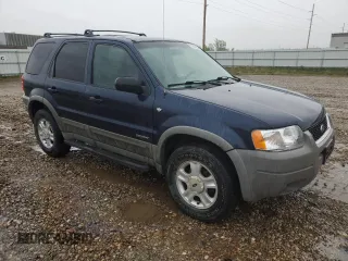 2002 Ford Escape XLT Choice with VIN 1FMYU04182KD34094, listed as a Copart auction lot 57299225 with 154,784 mi miles and Salvage title. Bid and sale history available at DreamBid. Image 4.