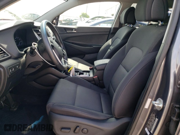 2018 Hyundai Tucson Sport z VIN KM8J33ALXJU764322, wystawiony jako Copart lot #59739985 z przebiegiem 79 882 mil mil oraz Szkoda całkowita • Salvage title. Historia ofert i sprzedaży dostępna na DreamBid. Obrazek 7.